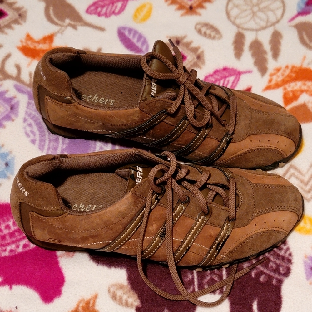 Brown leather skechers